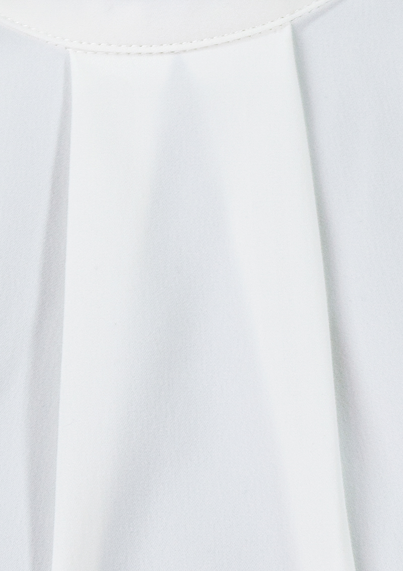 Bold white stylish summer top. Timeless modish chic
